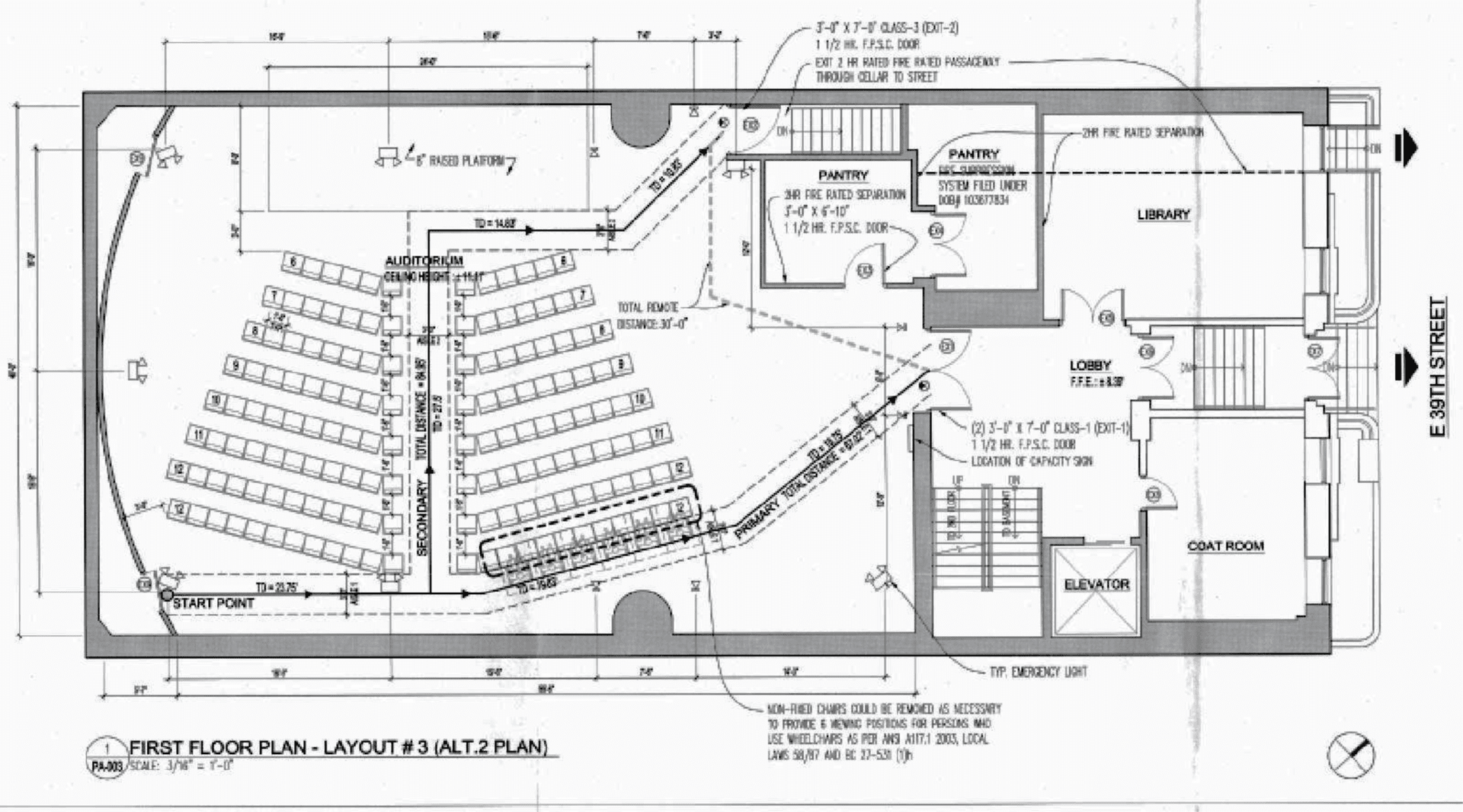 Floor plan of a theater space, showing seating, stage, and adjacent rooms, including elevators and stairs.