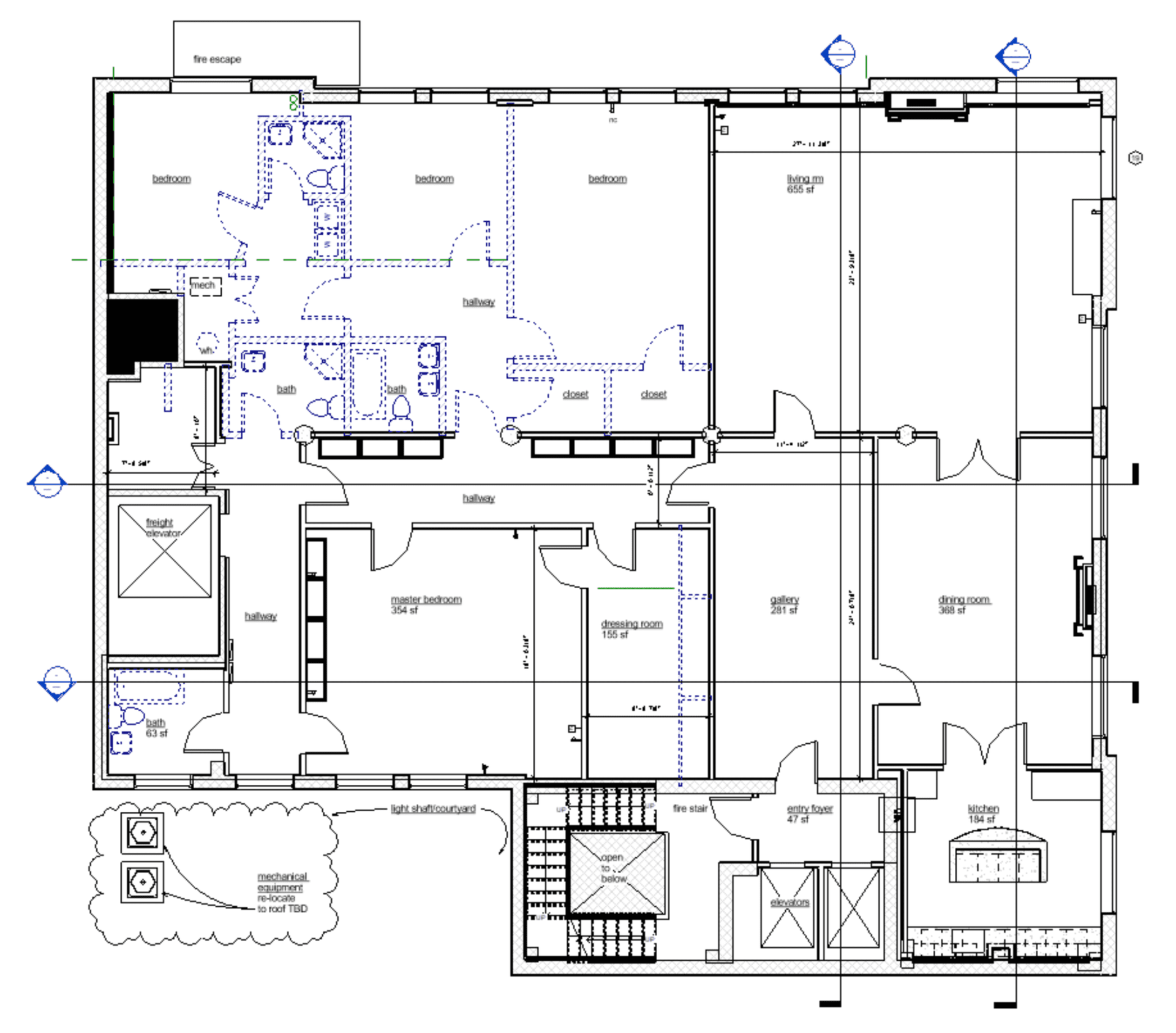Floor plan of a building with multiple rooms, including bathrooms, bedrooms, and storage areas.