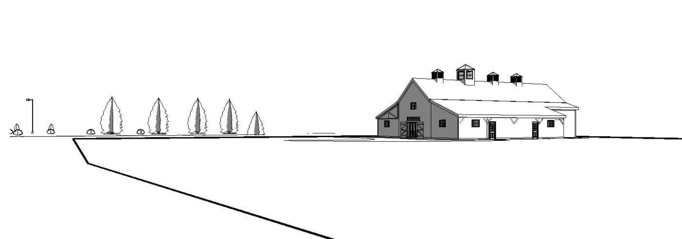 Barn and trees along a pathway.