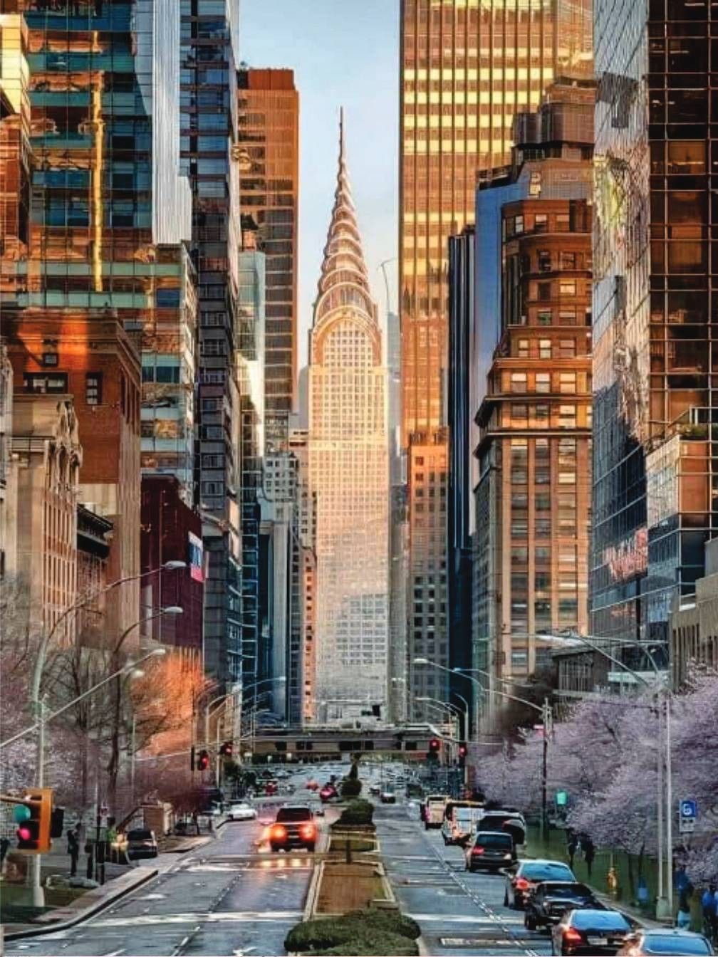 Floor plan of an apartment, showing rooms and layout. Sections are colored, including entry and bedrooms in tan.