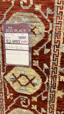 Rug marked down for a Rug Place 5th Saturday sale