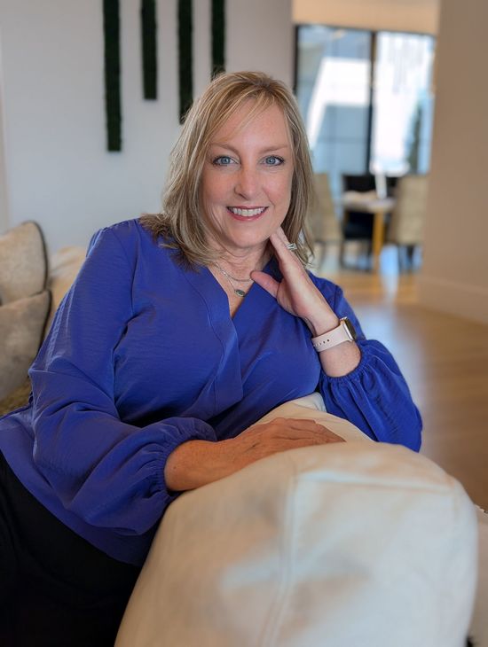 Woman sitting on couch