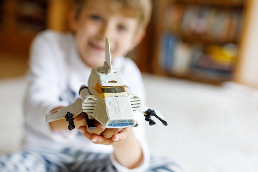 Kid Playing Space Shuttle Toy — Model Kits in Lismore, NSW