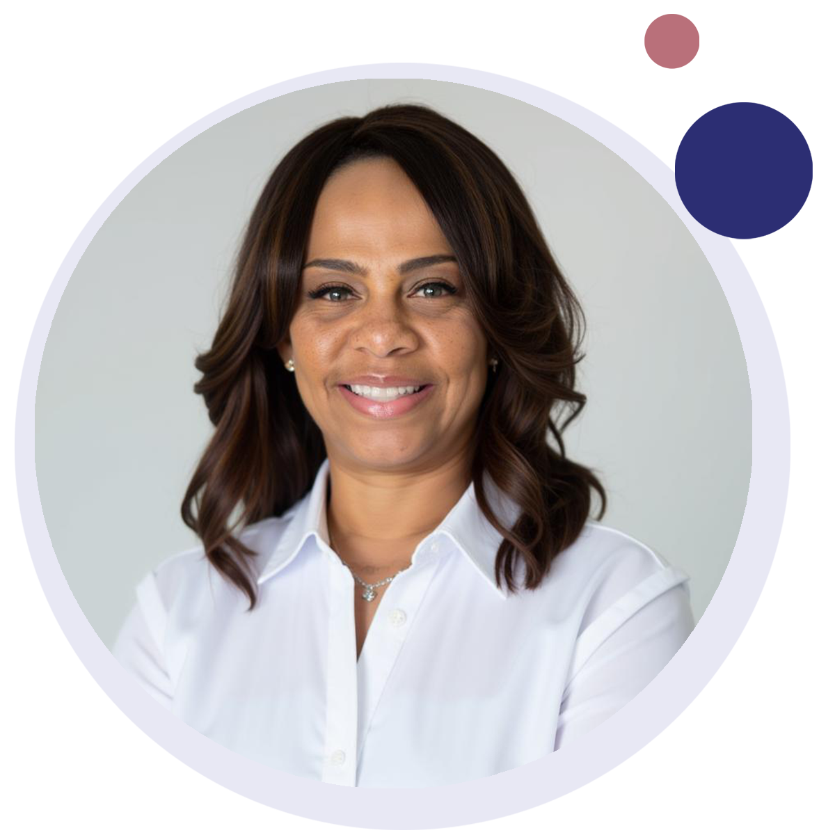 Agency owner Robbeyell McCormick wears a white shirt and is smiling in a circle frame.