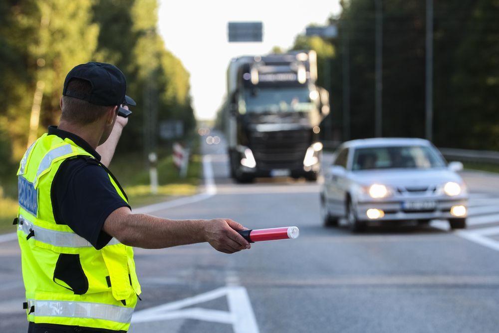 Police Man Directing Traffic — Certified Traffic Control in the Hunter Valley, NSW