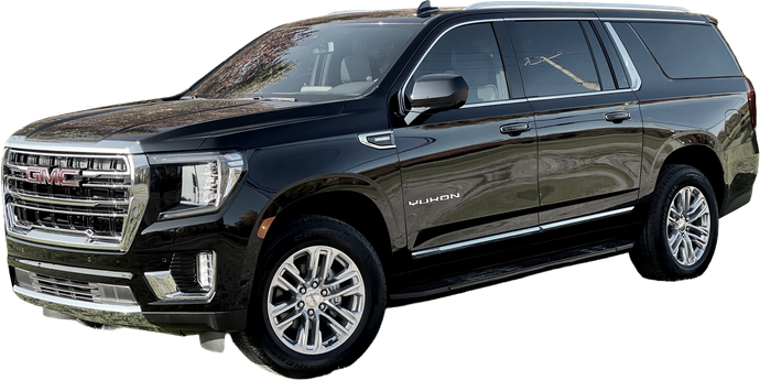 A black chevrolet suburban suv is parked on a white background.