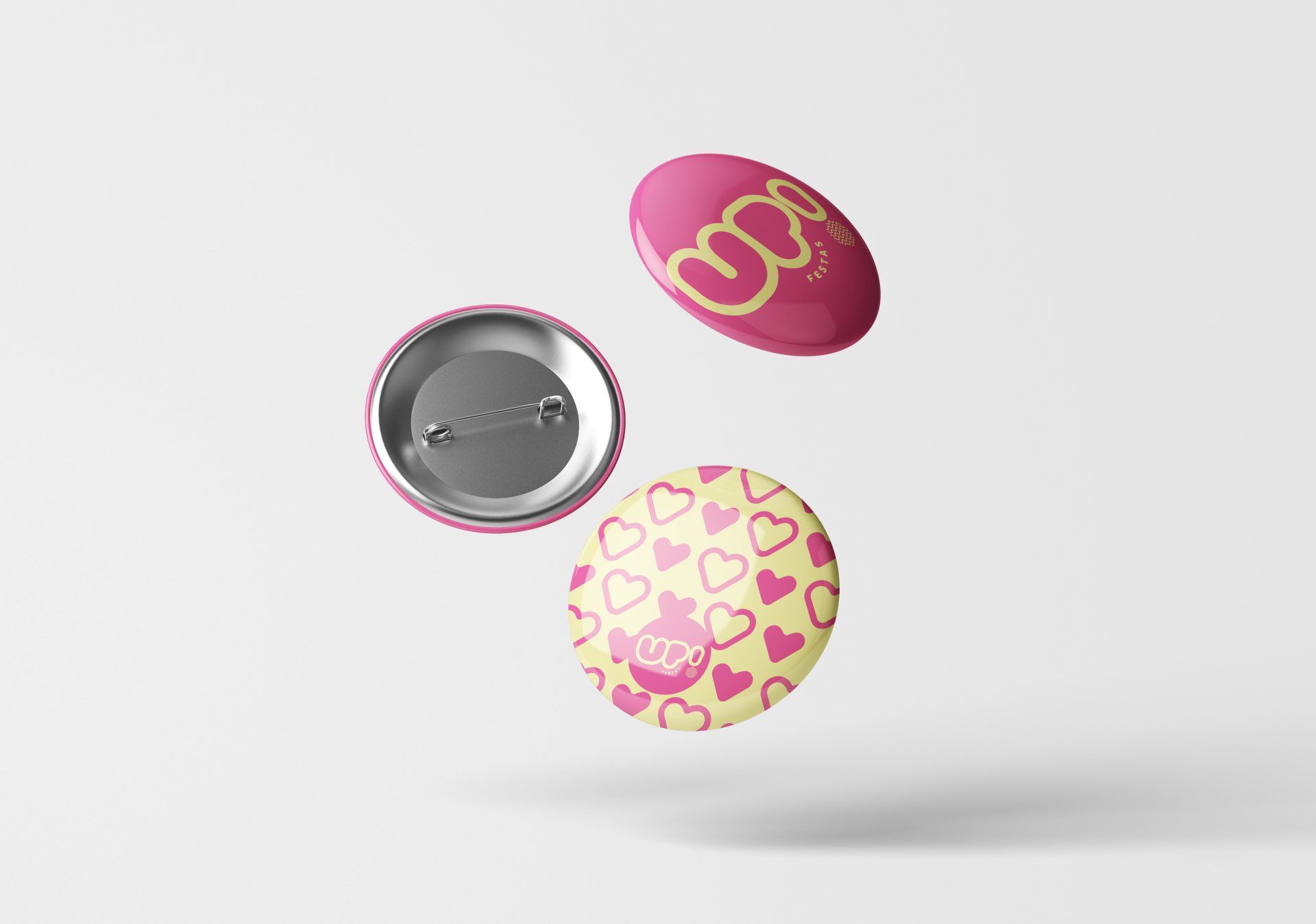 Três botões com corações estão flutuando no ar.