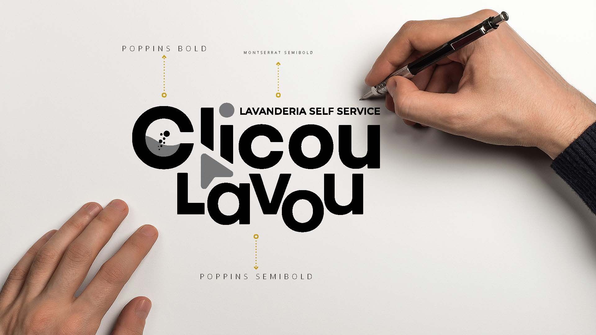 A person is writing the word clicou lavou on a piece of paper