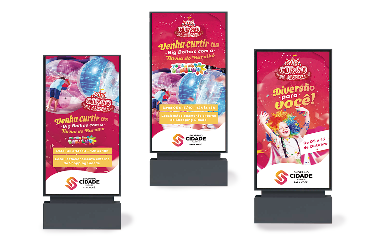 Três placas luminosas anunciam um centro de entretenimento infantil chamado