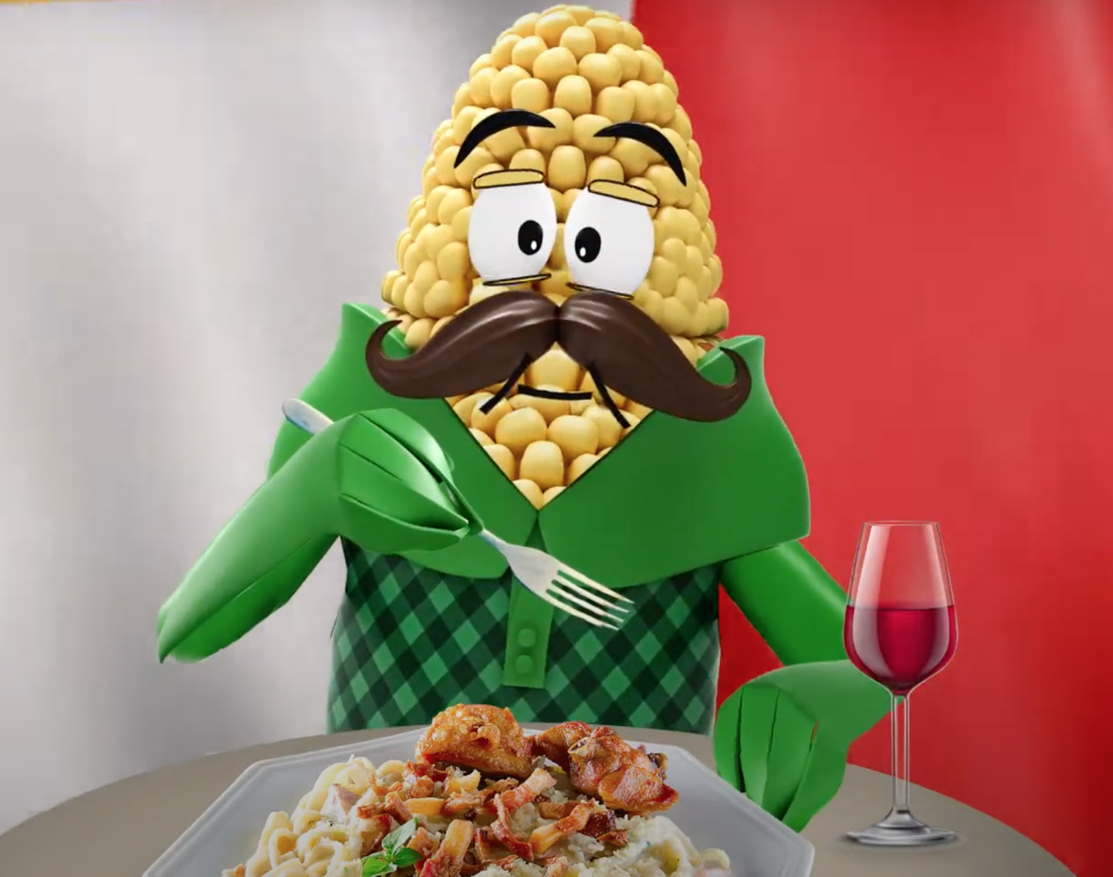 Personagem de milho animado com bigode, comendo macarrão com um garfo e uma taça de vinho em frente à bandeira italiana.