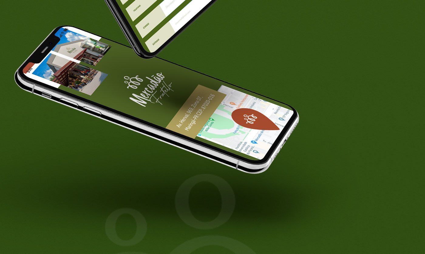 Dois telefones estão flutuando no ar sobre um fundo verde.