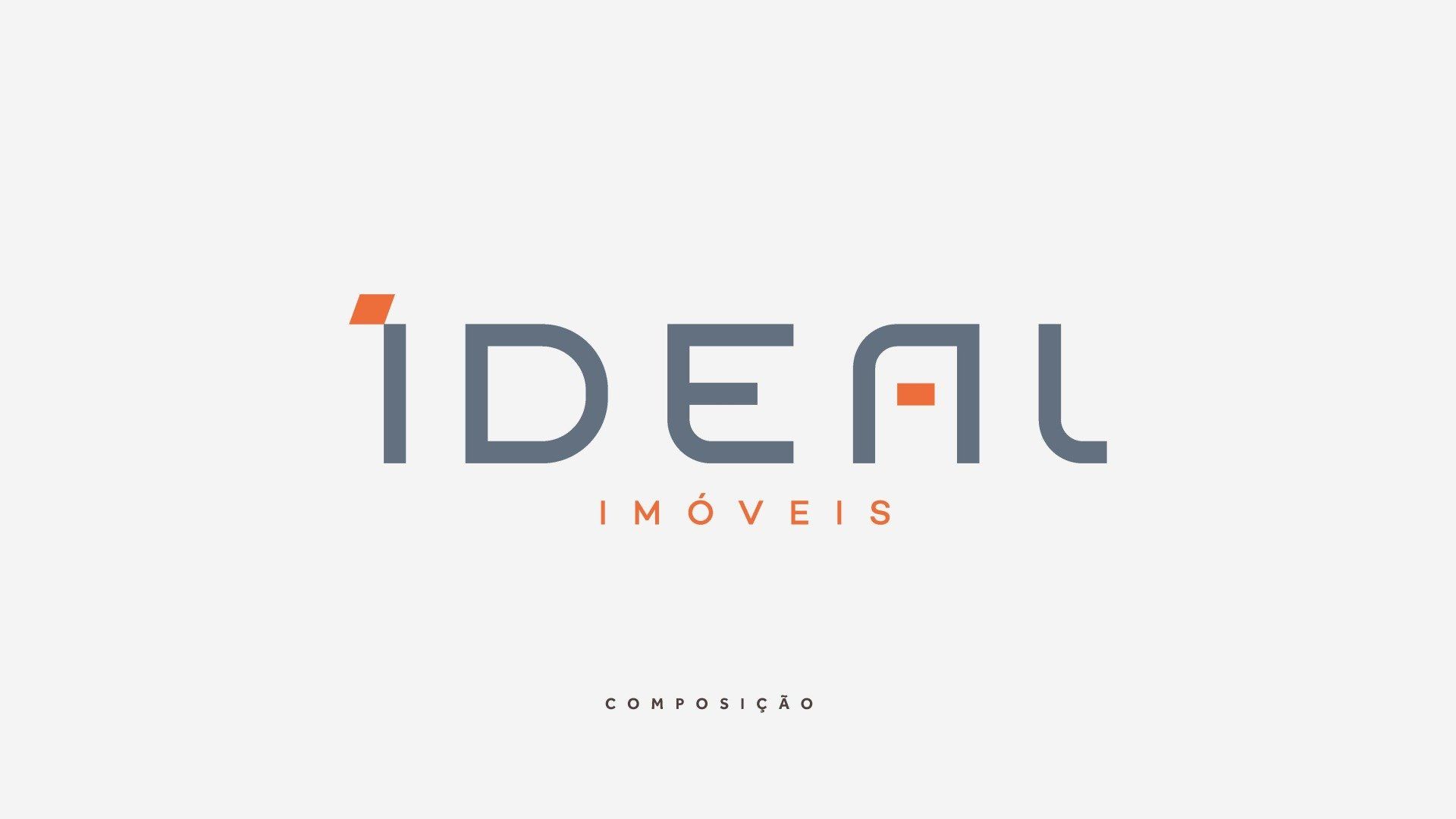Um logotipo para uma empresa chamada ideal imoveis em um fundo branco.