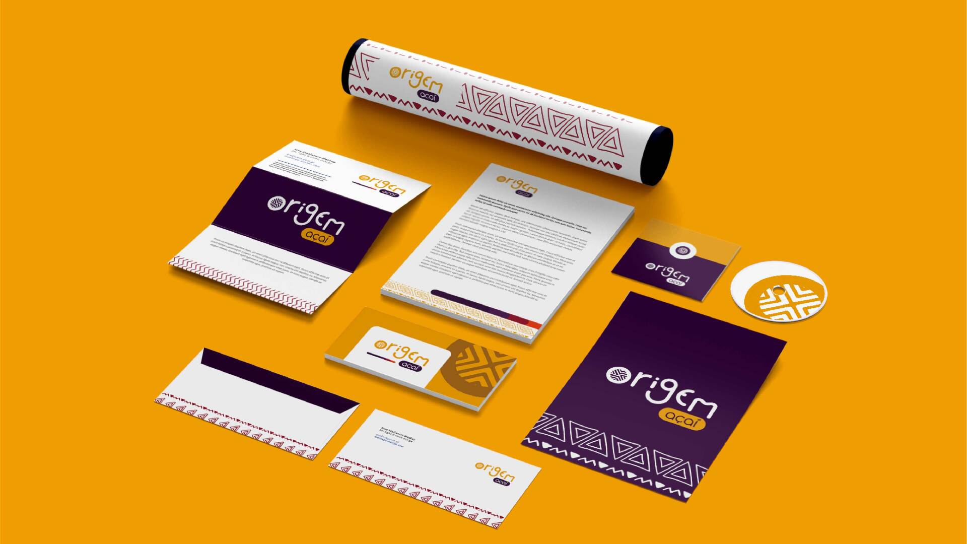 A bunch of papers and envelopes are laying on a yellow surface.