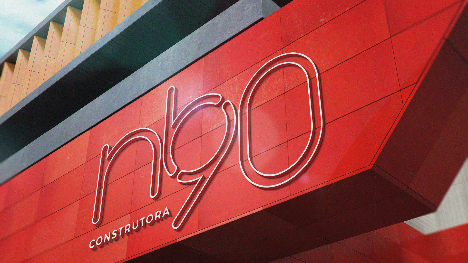 Close-up de um prédio vermelho com o logotipo