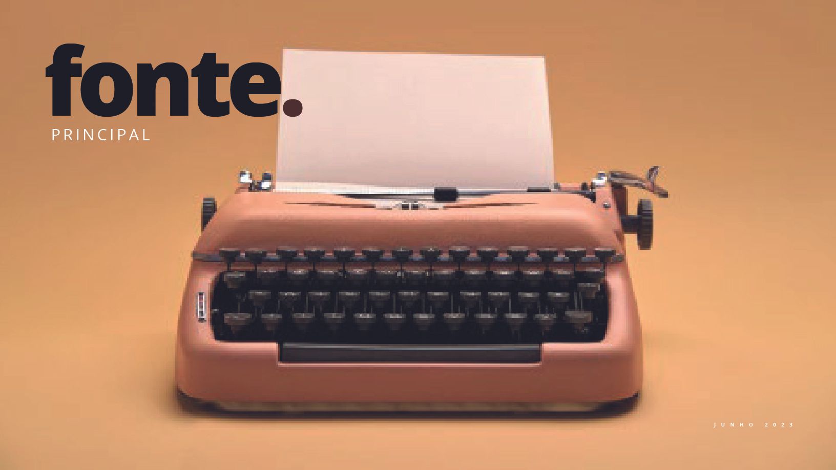 Máquina de escrever rosa com papel, sobre um fundo cor de pêssego. As palavras