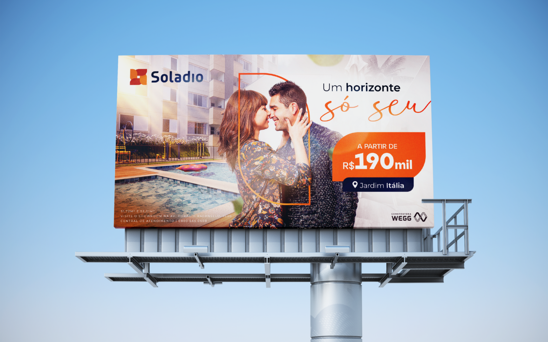 Billboard with couple embracing, advertising Solédio real estate. Text says