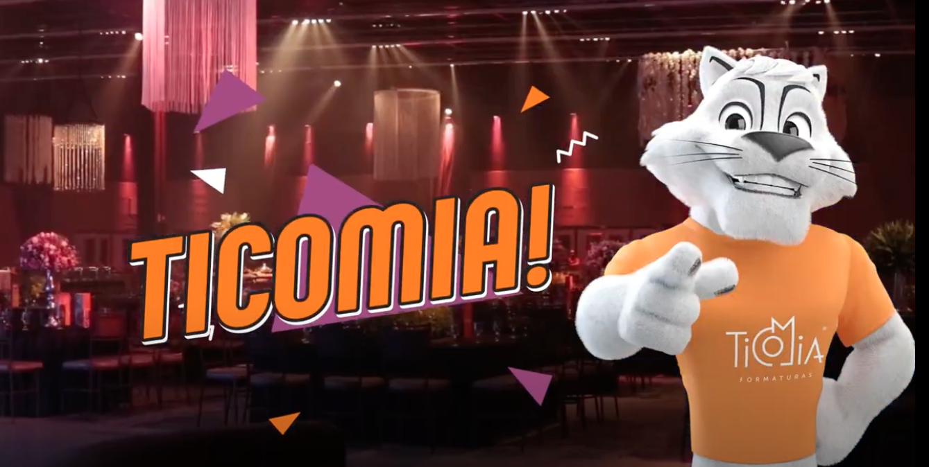 Um mascote tigre branco aponta para o espectador, com