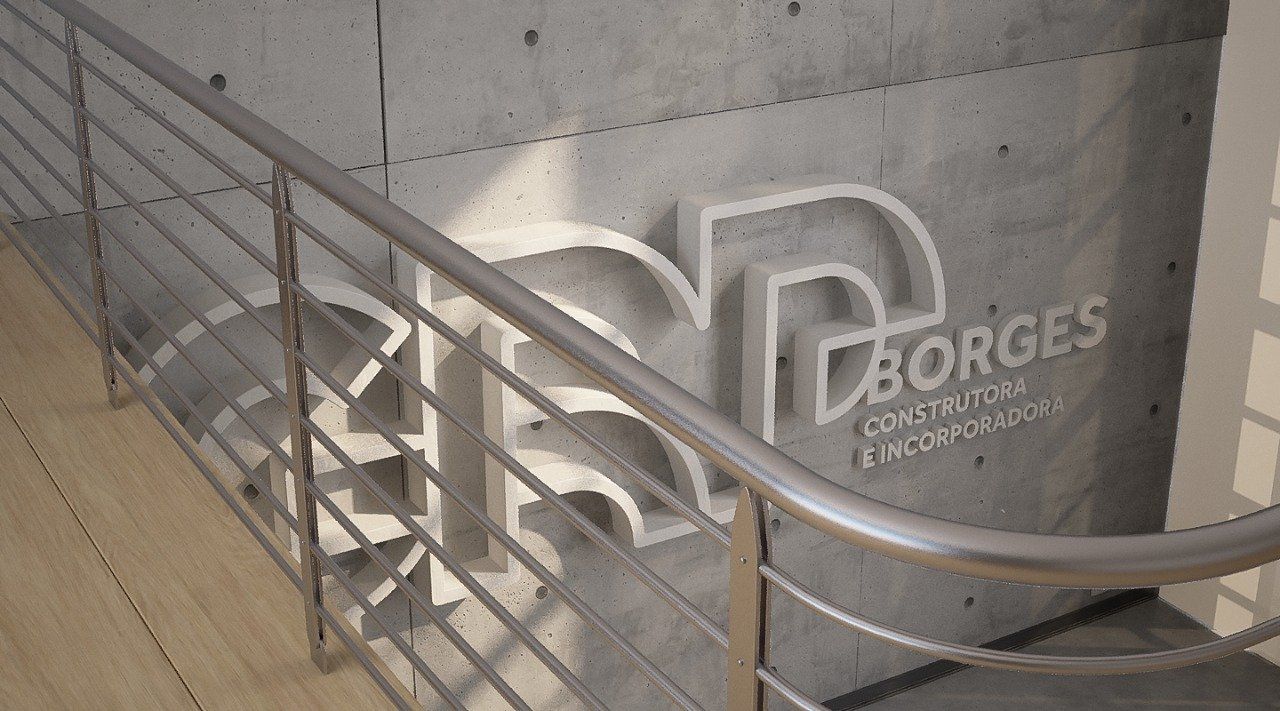 Corrimão de aço inoxidável e vista parcial de uma parede de concreto com o logotipo da empresa