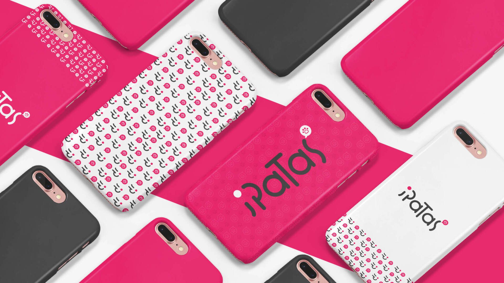 Capas de celular em diversas cores e estampas, dispostas sobre uma superfície rosa, com a marca