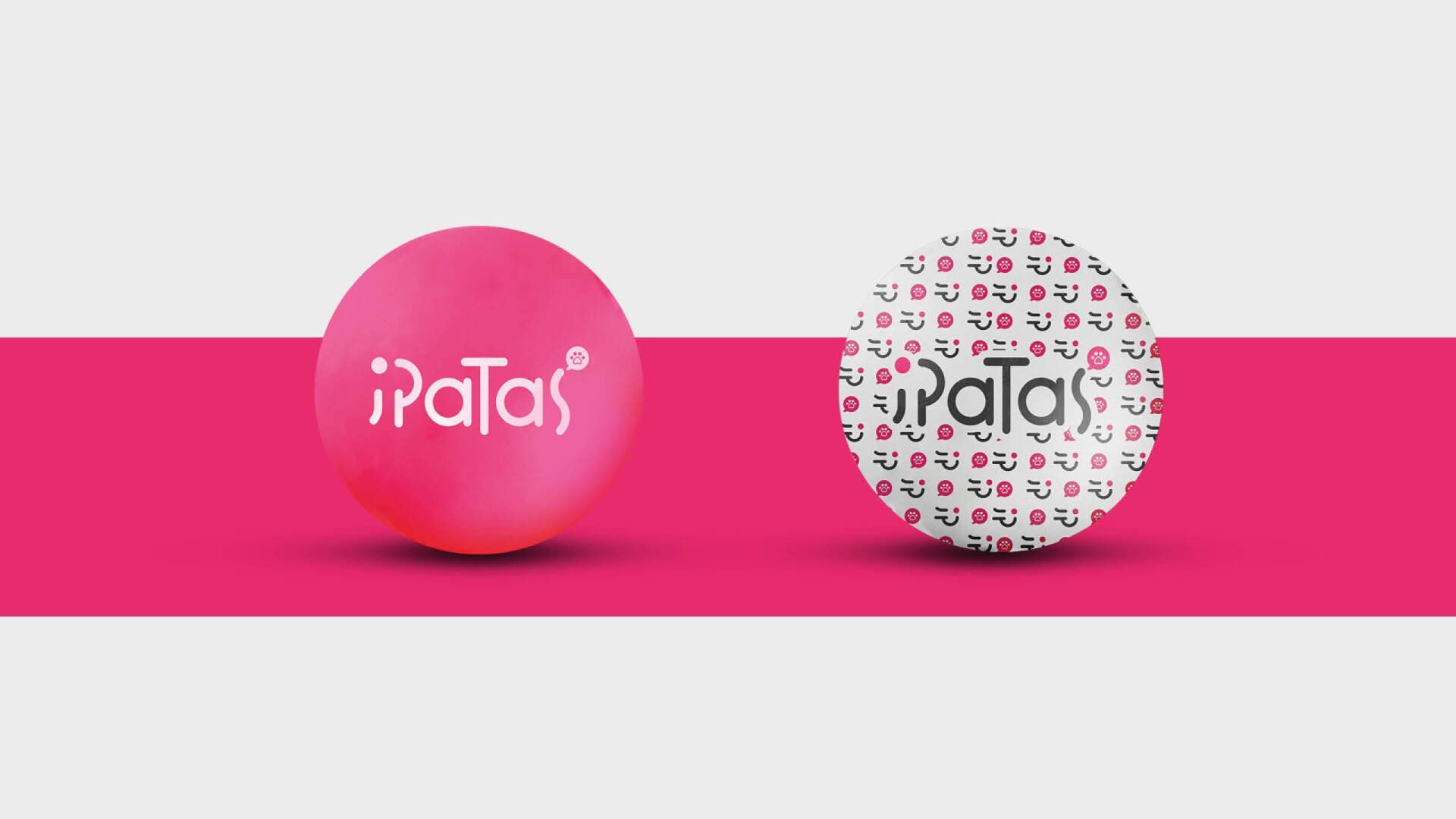 Duas esferas rosas, uma lisa e outra estampada, exibindo o logotipo