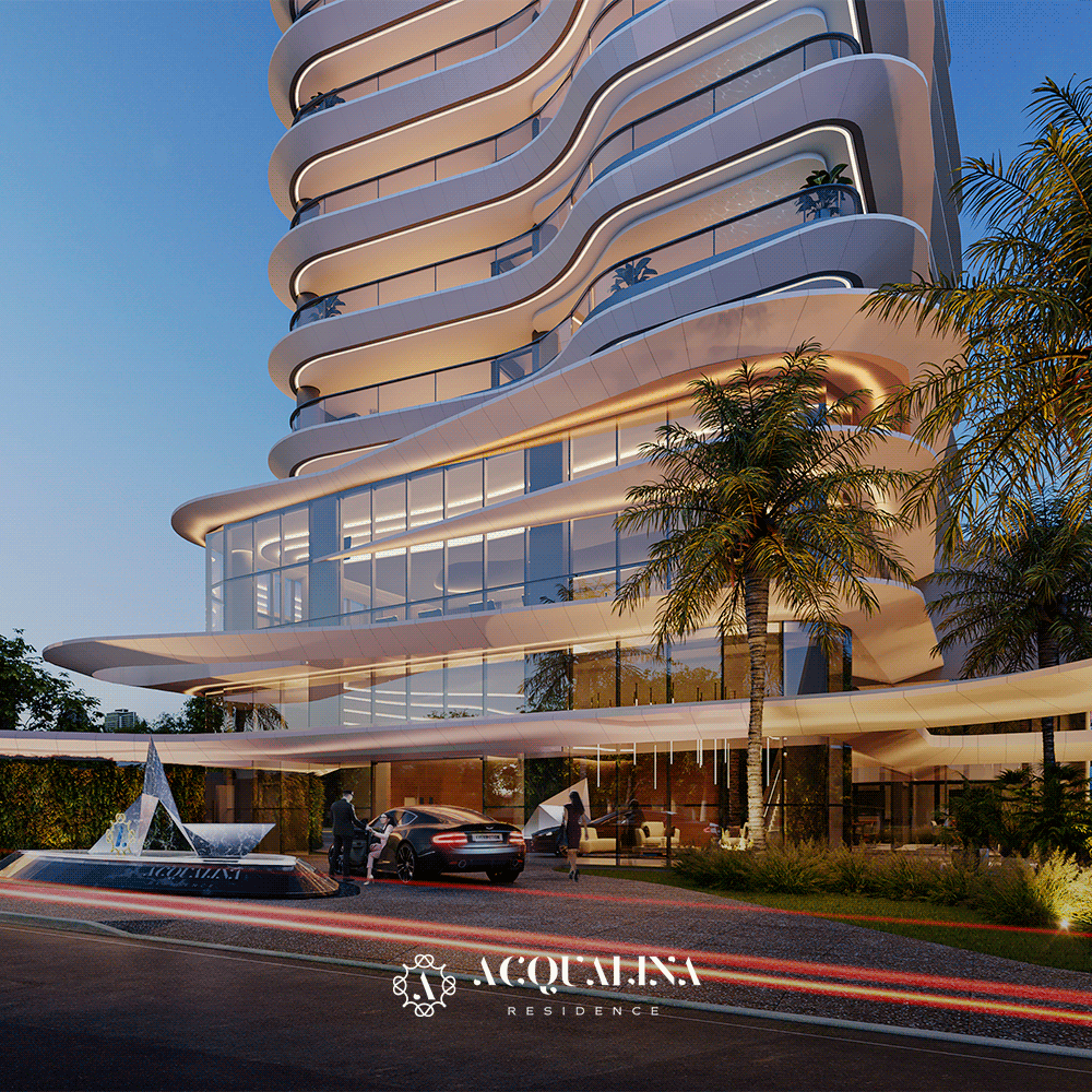 Edifício moderno e alto com varandas onduladas. Um carro está estacionado sob um beiral na entrada, com palmeiras por perto.