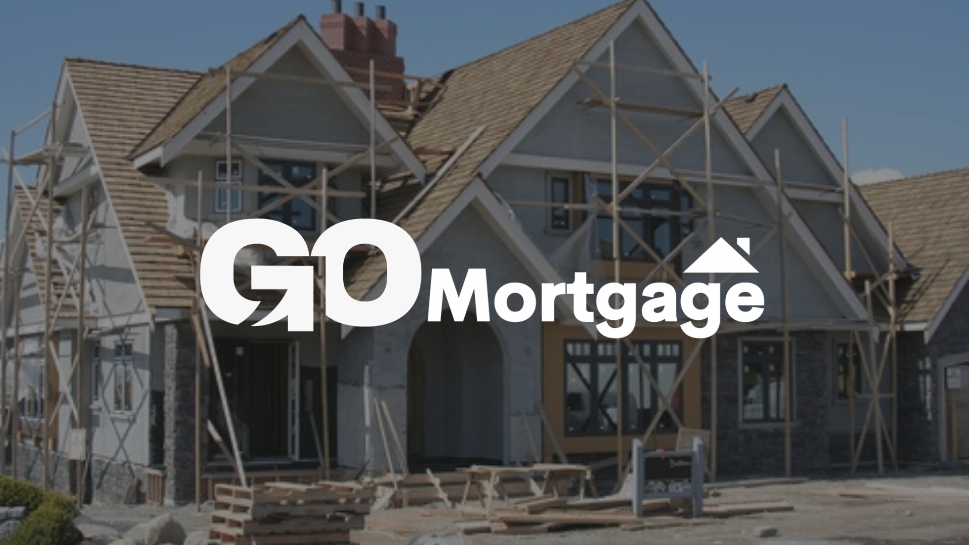 A house is being built with the go mortgage logo in the foreground.