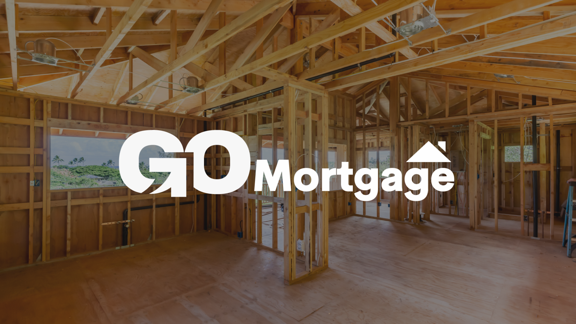 The logo for go mortgage is on a picture of a house under construction.