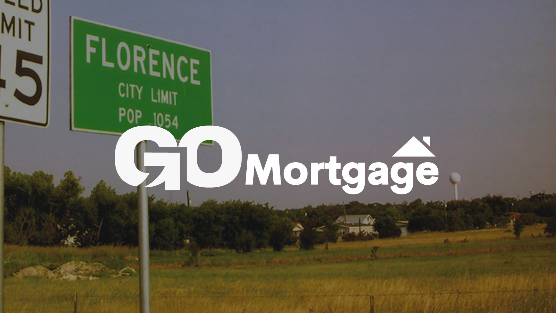 Sign for Florence, population 1054, with the Go Mortgage logo overlaid, set in a rural landscape.