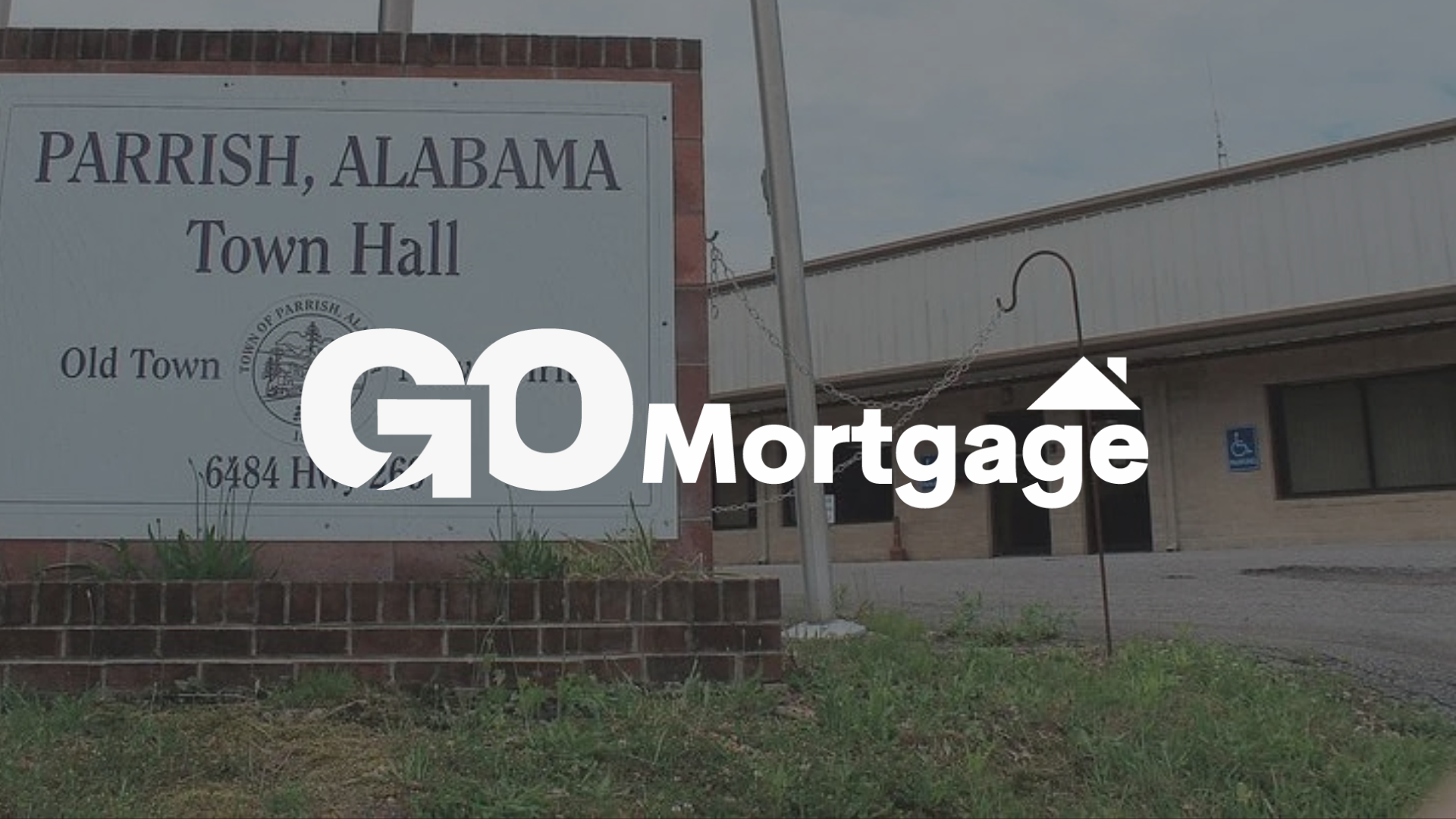 A sign that says parrish alabama town hall on it with go mortgage logo on top