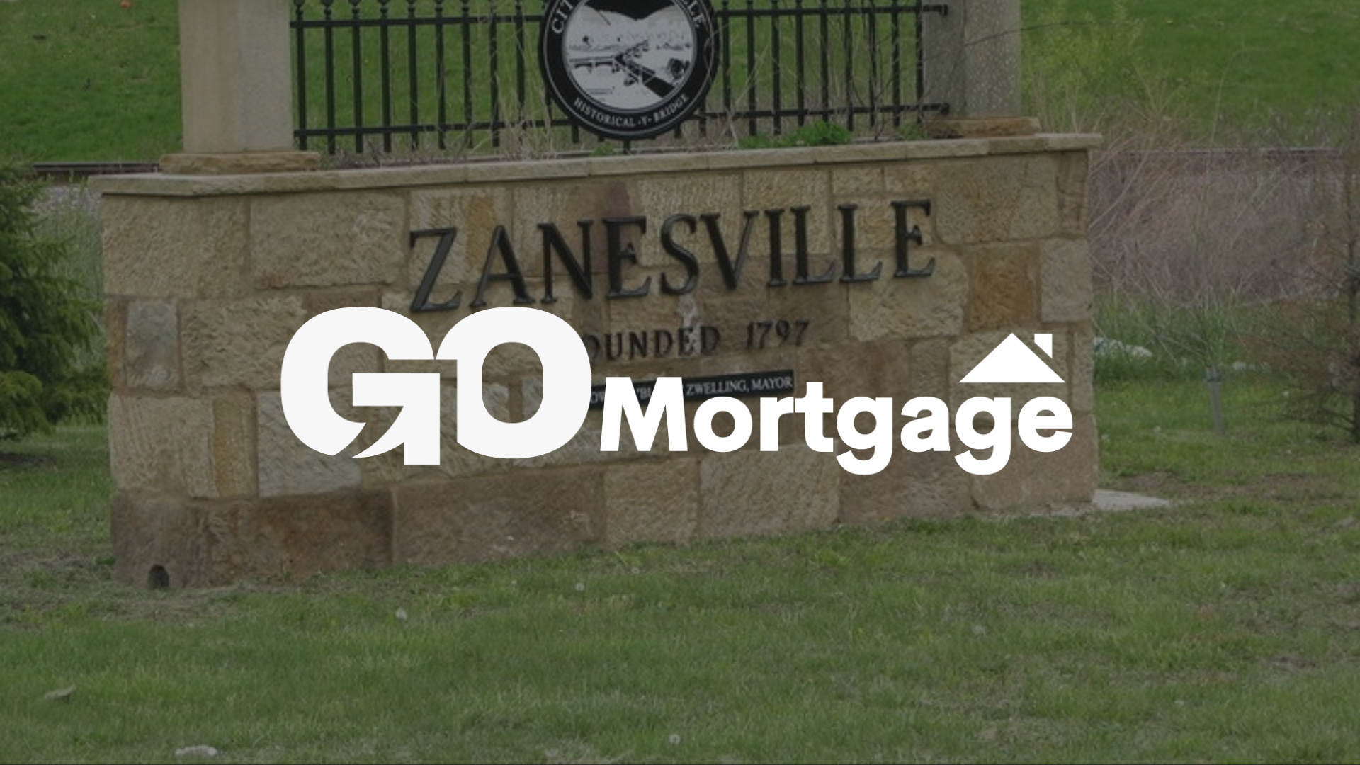 A sign that says zanesville ohio go mortgage on it