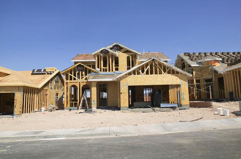 A large house is being built in the desert