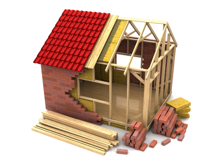 A model of a house under construction with bricks and wood