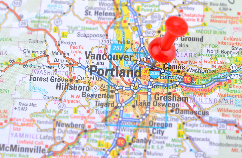 A map of portland with a red pin on it.