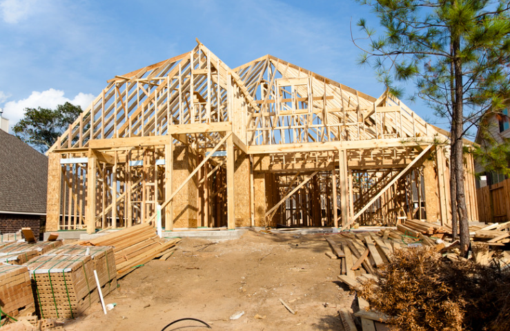 A house is being built with a lot of wood.