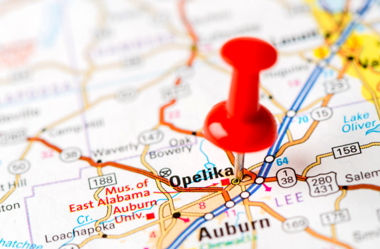 A red pin is pinned to a map of alabama