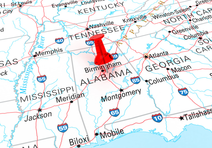 A map of alabama with a red pin on it