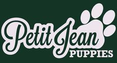 A logo for petit jean puppies with a paw print