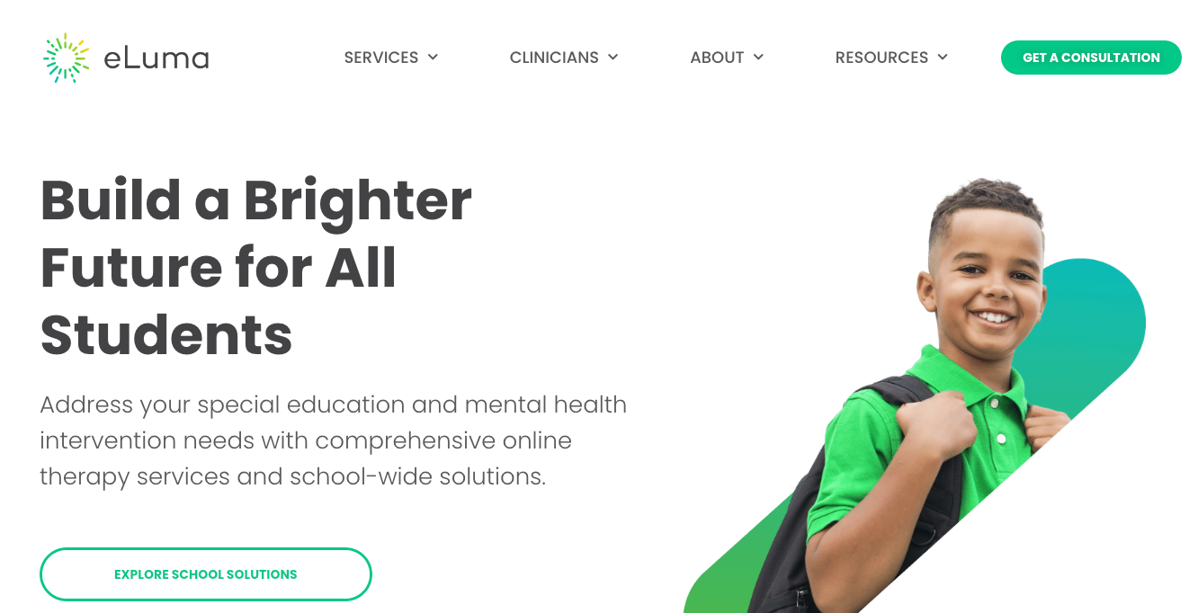 A boy is holding a skateboard on a website that says build a brighter future for all students.