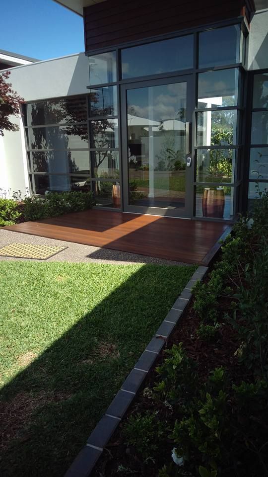 Large Building With A Lot Of Windows And A Lawn In Front Of It — Shane's Painting & Timber Restorations In Crows Nest, QLD