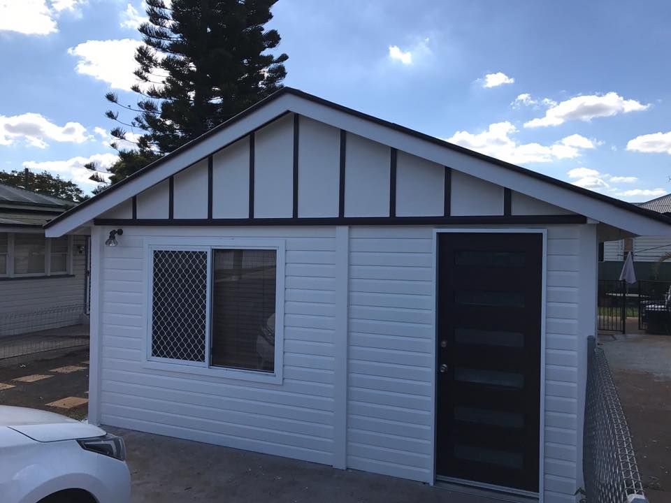 Small White House With A Black Door And Window — Shane's Painting & Timber Restorations In Crows Nest, QLD