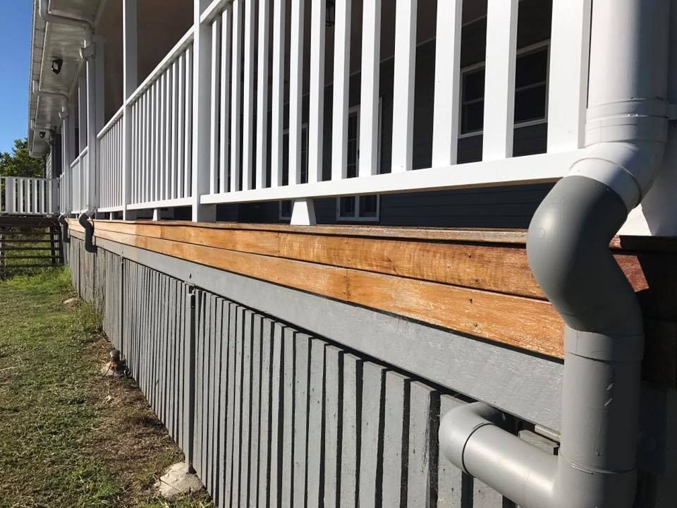 Porch With A White And Grey Railing And A Wooden Deck — Shane's Painting & Timber Restorations In Dalby, QLD