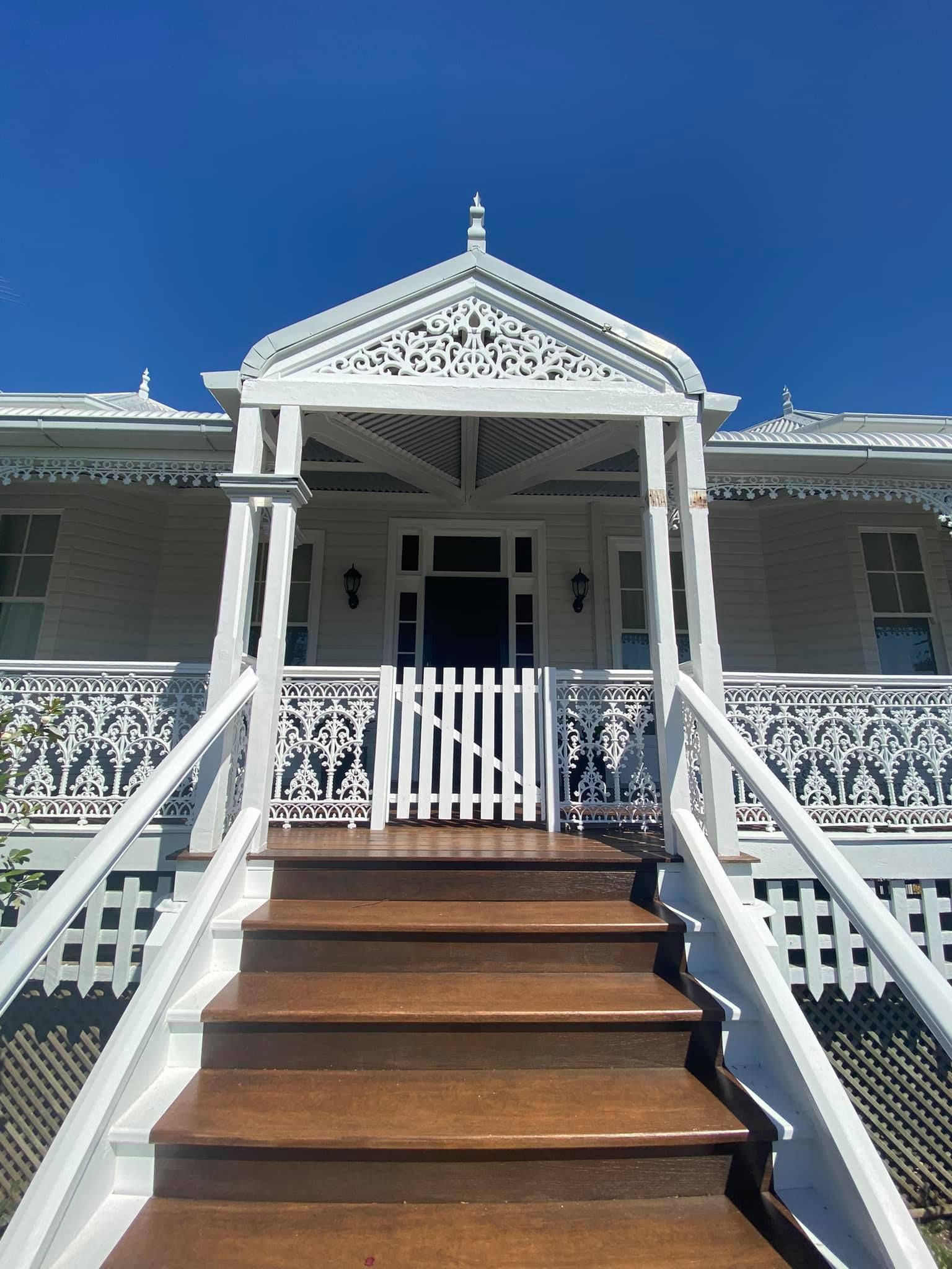 Fully Painted Exterior Of A White House With Stairs — Shane's Painting & Timber Restorations In East Toowoomba, QLD