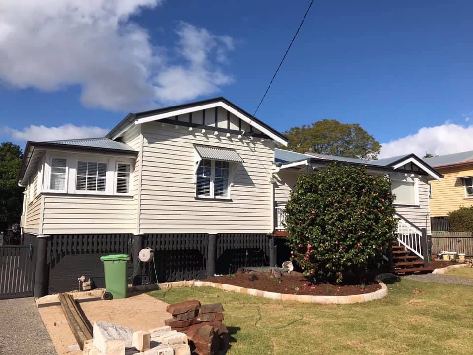 White House With A Green Trash Can In Front Of It — Shane's Painting & Timber Restorations In East Toowoomba, QLD