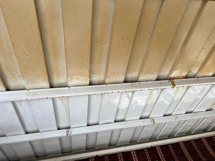 A close up of the ceiling of a building.