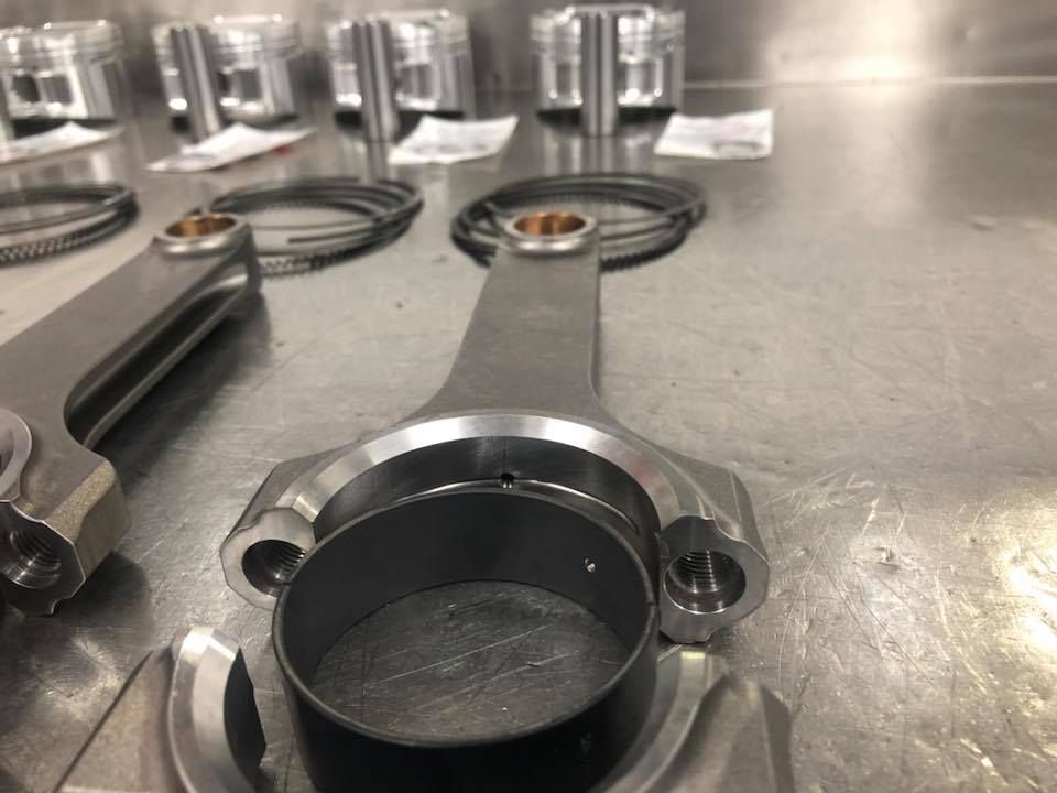 A close up of a piston on a table