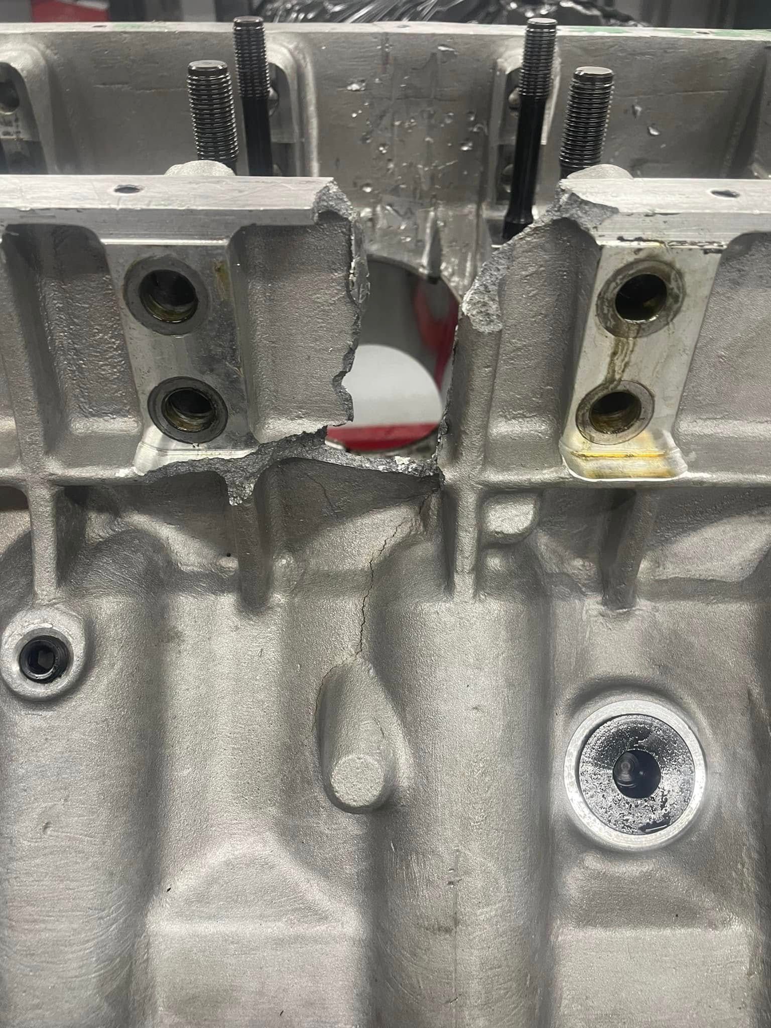 A close up of a metal object with a hole in it.