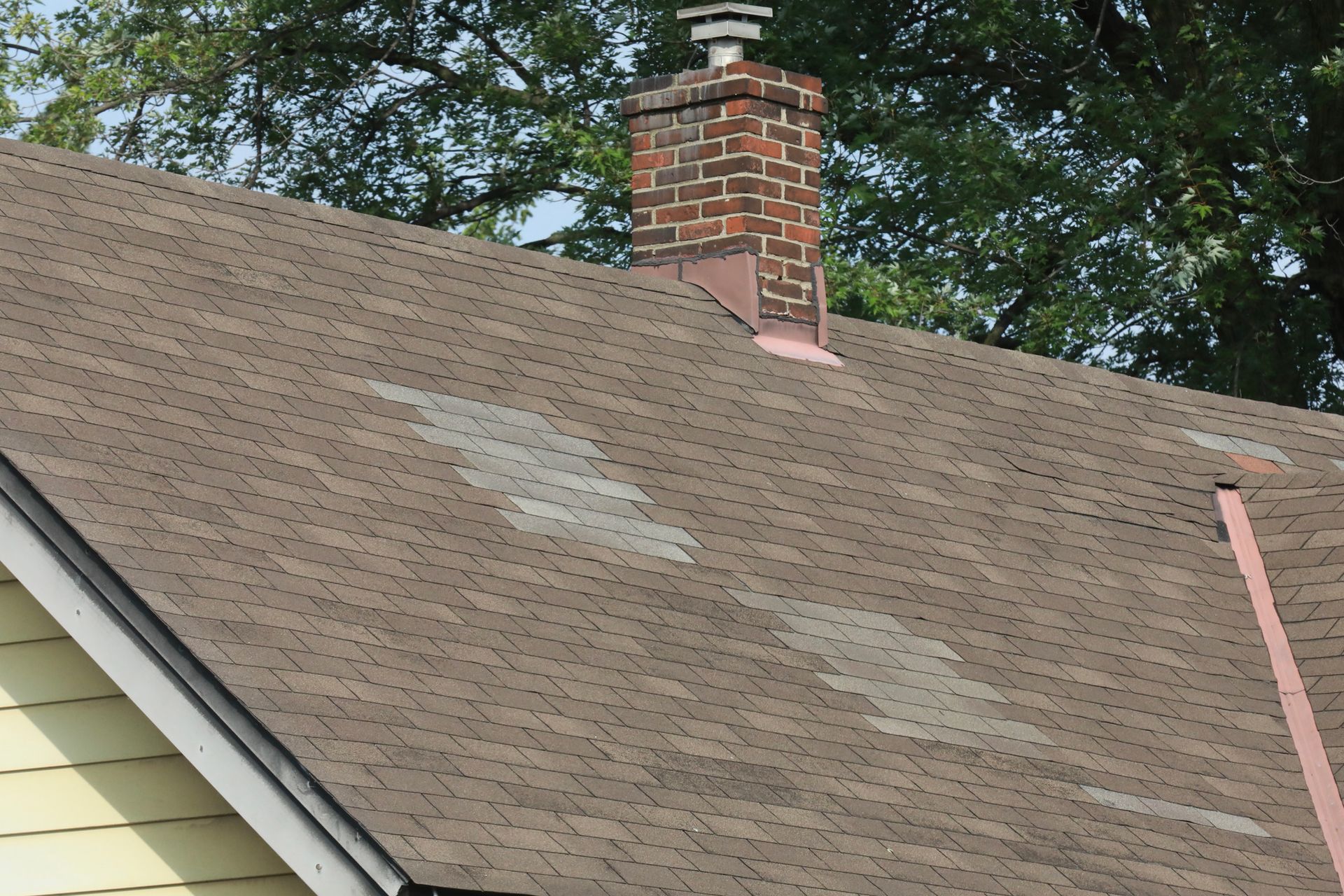 Woman Climbing To The Roof On A Sunny Day — Brooksville, FL — John Scott Roofing