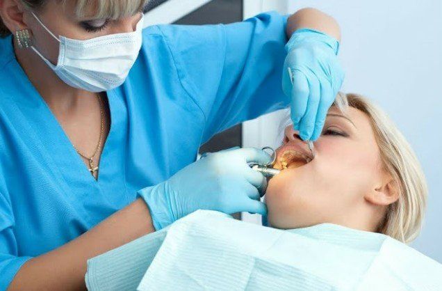 Dentist Checking Patient's Teeth — Naples, FL — Bradley Piotrowski, DDS, MSD, LLC