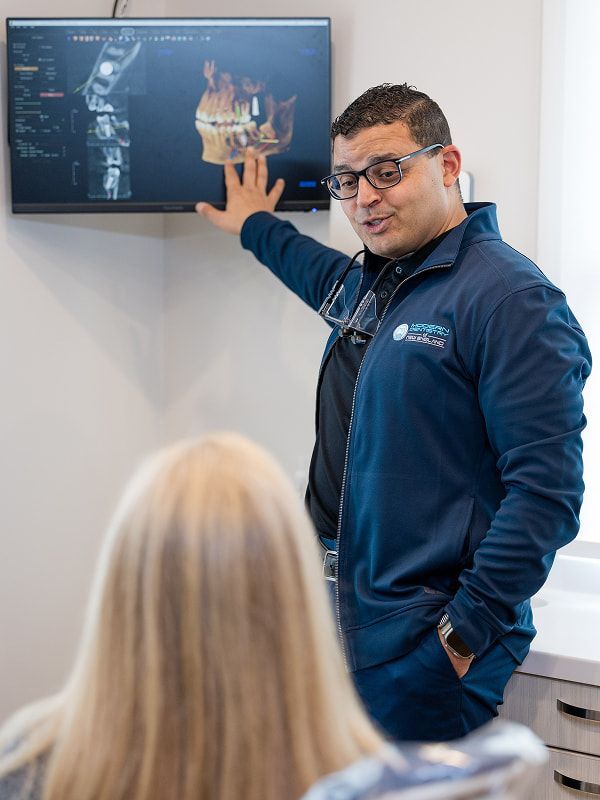 Dr. Gabr talking to a patient