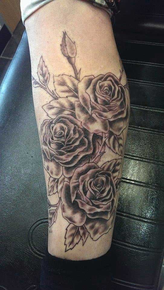 rose arm tattoo
